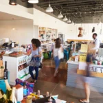 interior of busy delicatessen with customers